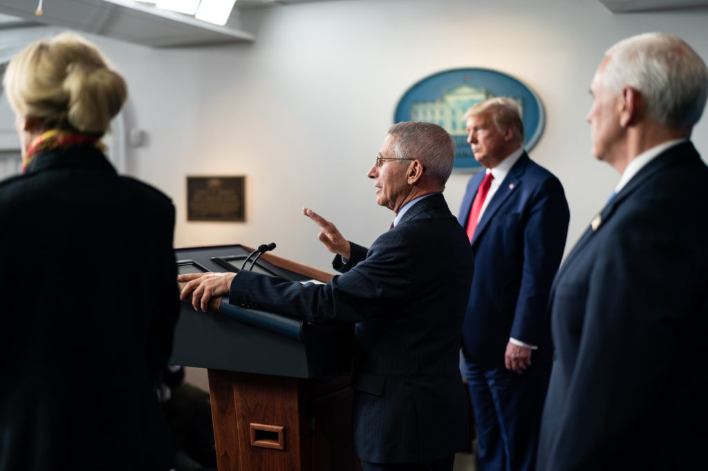 President Donald J. Trump, joined by Vice President Mike Pence, listen as Director of the National Institute of Allergy and Infectious Diseases Dr. Anthony S. Fauci takes questions from the press during a coronavirus update briefing Tuesday, March 31, 2020, in the James S. Brady Press Briefing Room of the White House.